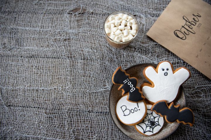 white and black halloween treats on round plate